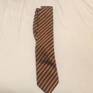 Italian maroon and yellow striped tie.
